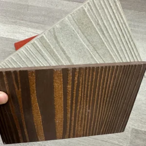 Wood grain fiber cement siding